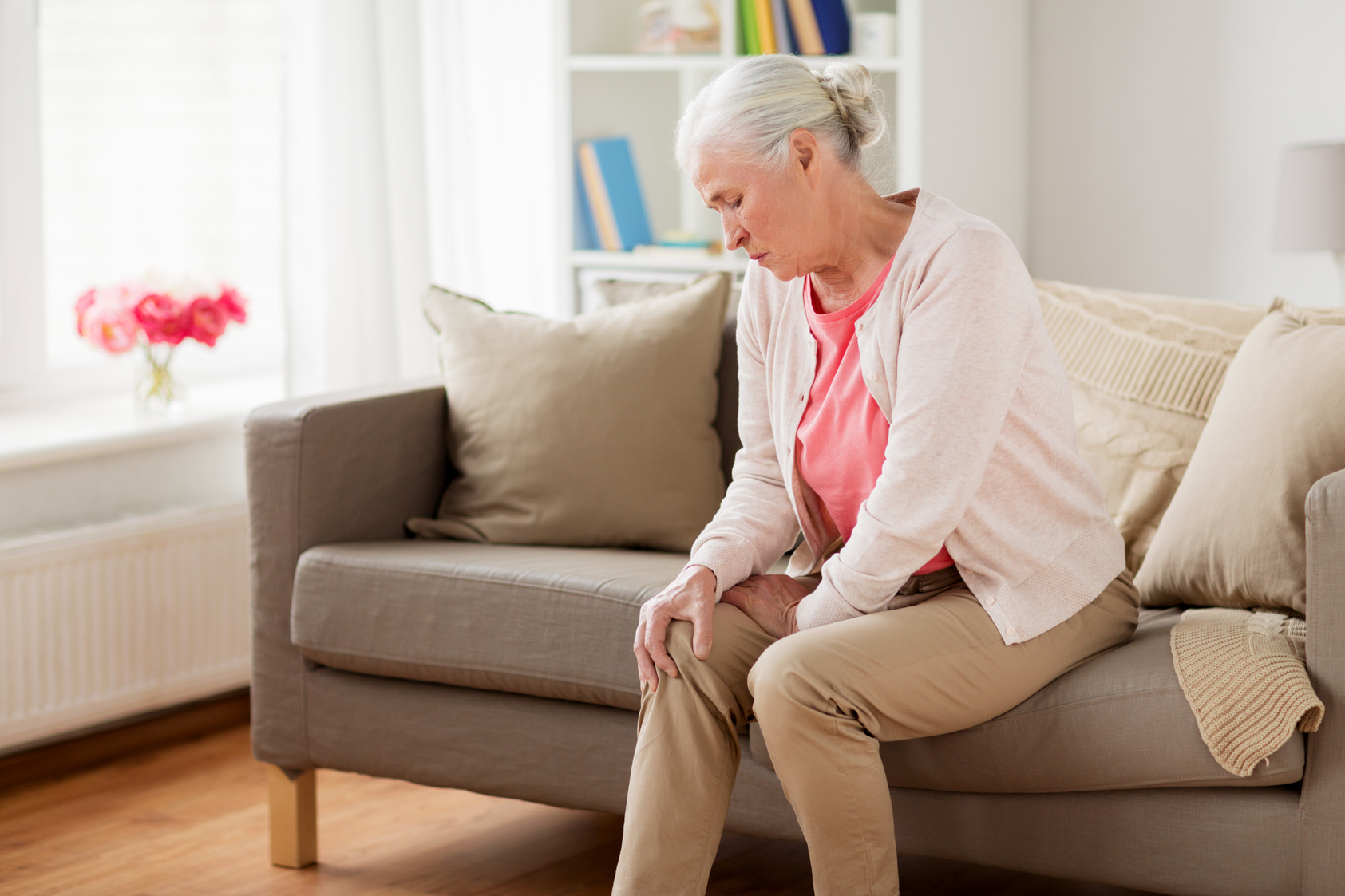 Senior Woman Suffering from Pain in Leg 